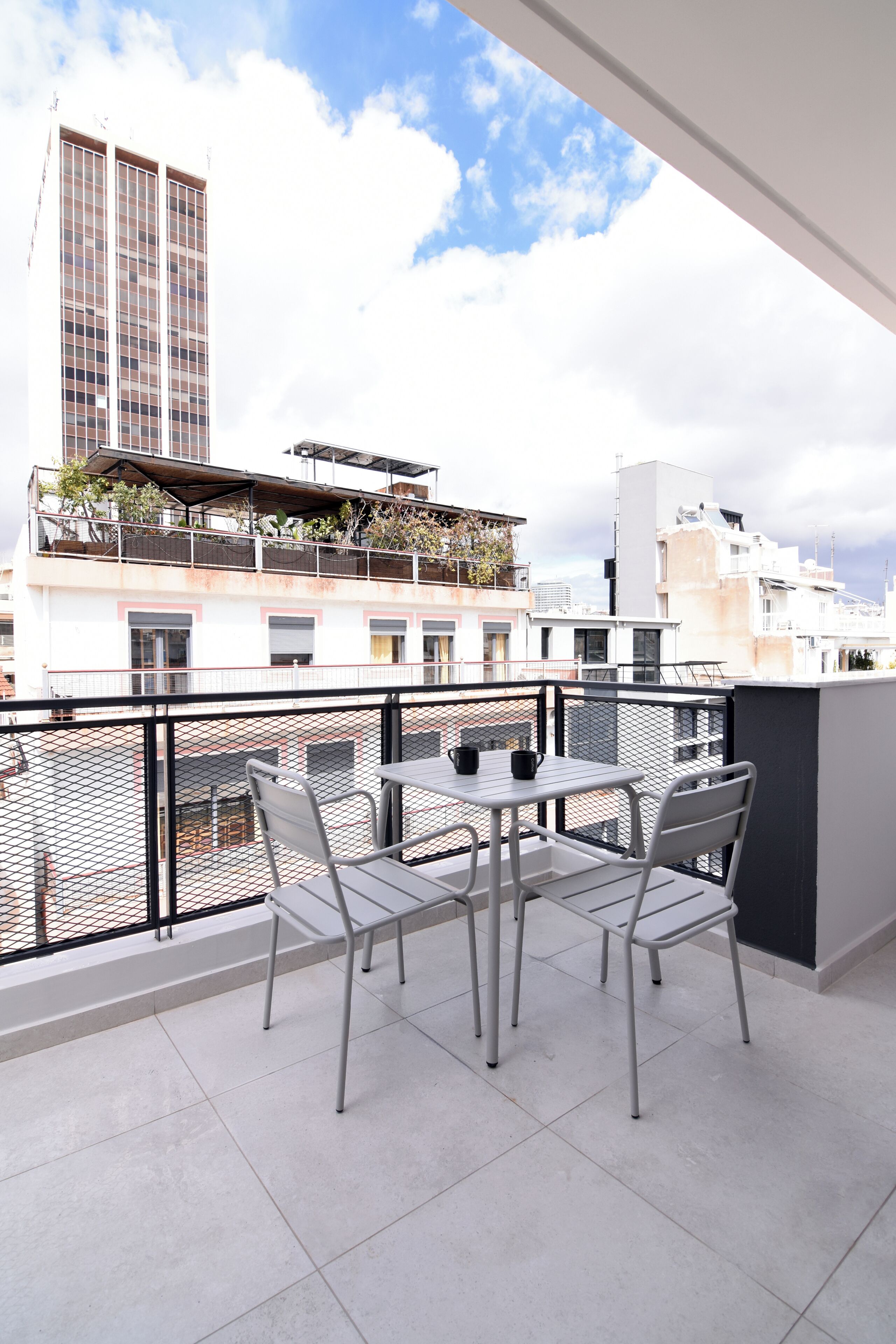 Deluxe-Studio, Balkon, Stadtblick | Speisen im Freien