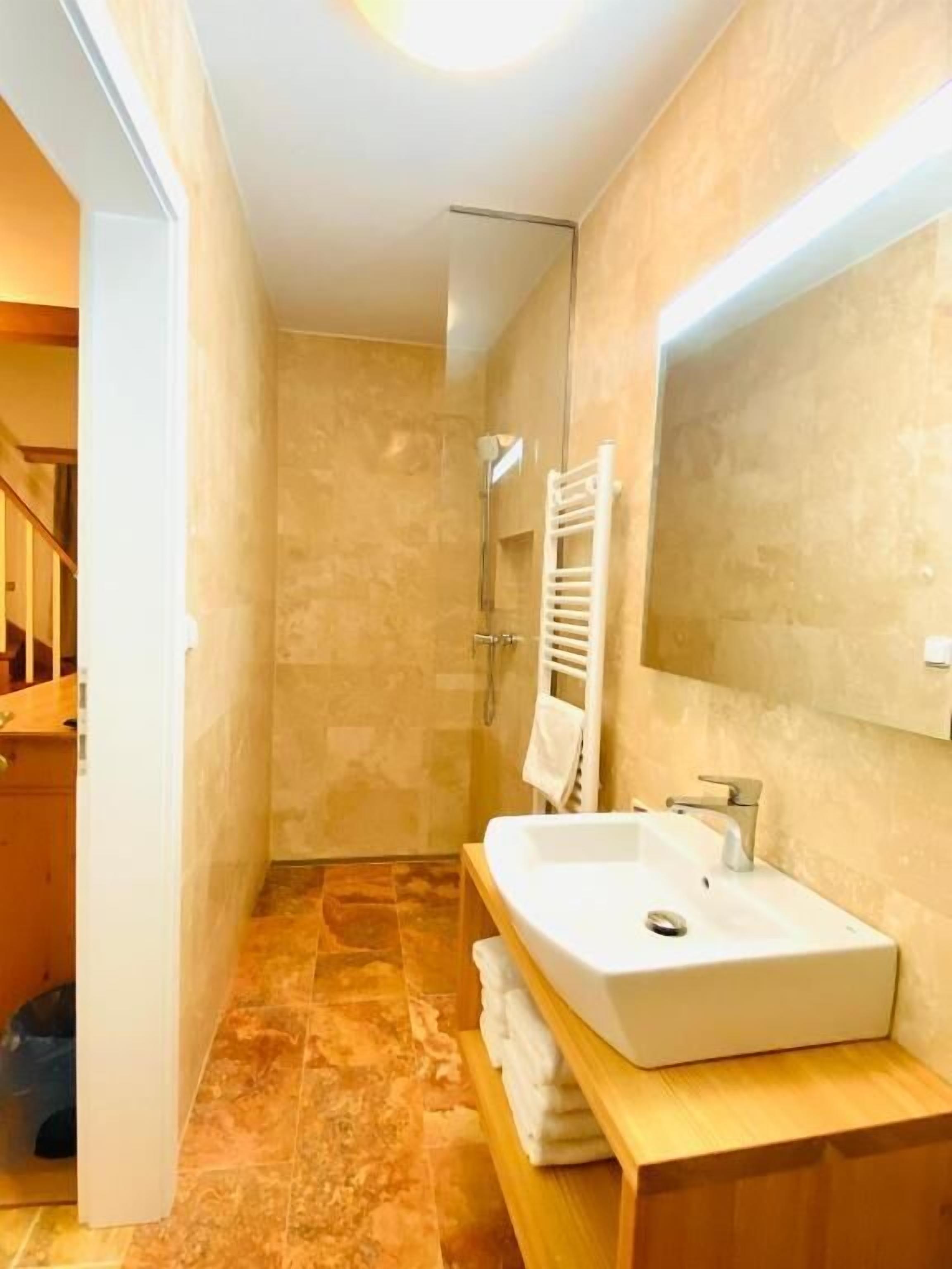 Deluxe Quadruple Room, Balcony, City View | Bathroom | Hair dryer, towels, soap, toilet paper