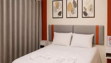 Premium bedding, pillowtop beds, desk, laptop workspace