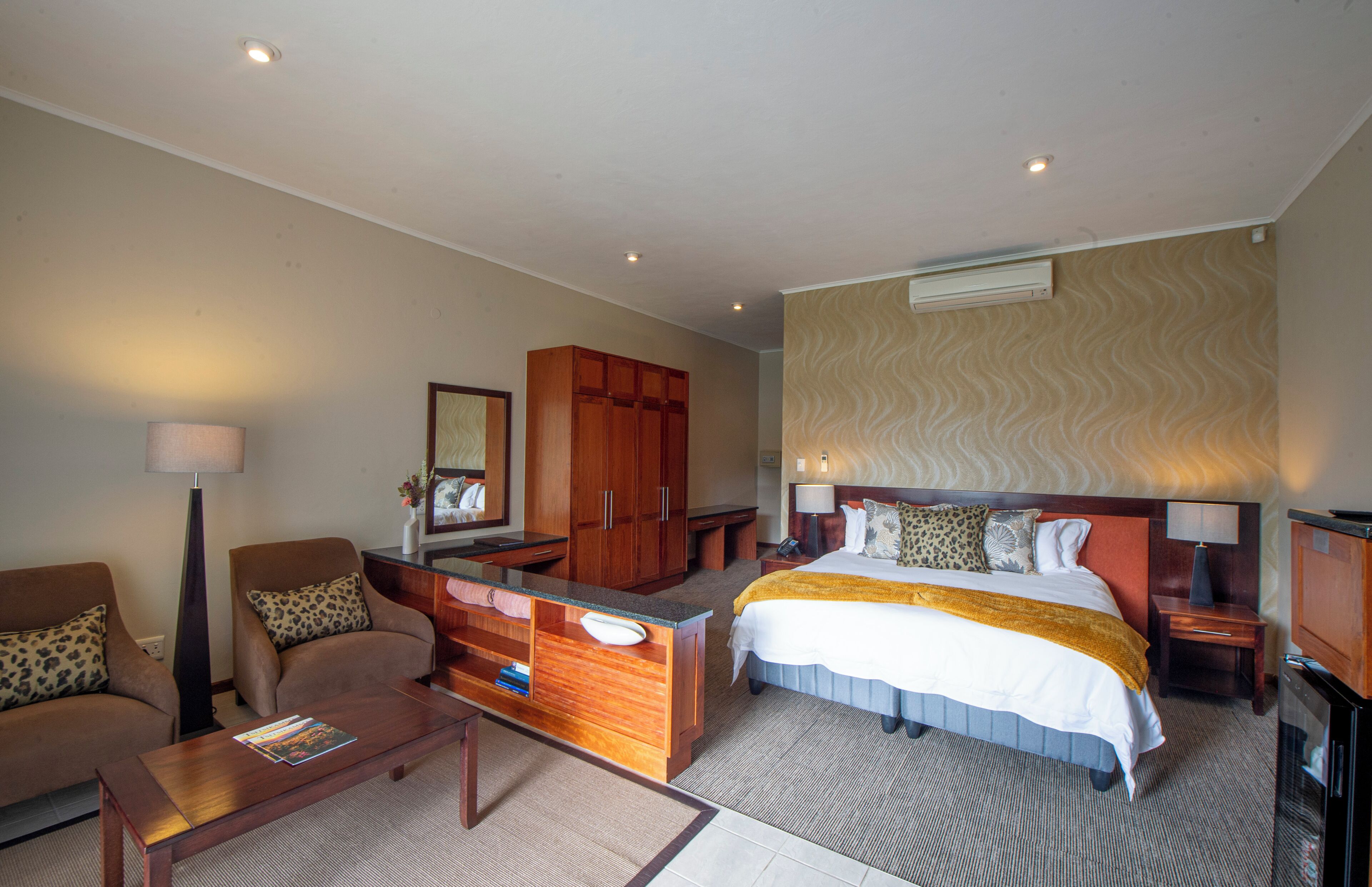 Suite, Patio, Garden View | Premium bedding, free minibar items, in-room safe, desk
