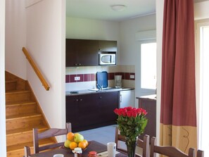 Apartamento | Cozinha privada | Cadeirão de bebê