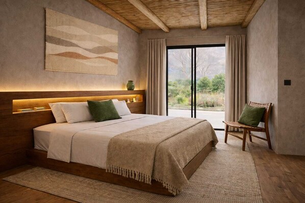 A bedroom with a bed, a chair, a window, and a view of the outdoors.