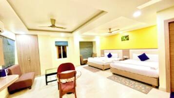 Premium bedding, desk, laptop workspace, soundproofing