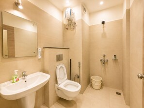 Shower, rainfall showerhead, free toiletries, bidet - Hotel Royal Beach Palace -near Sea Beach (Brahmagiri)