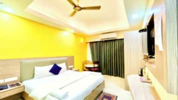 Premium bedding, desk, laptop workspace, soundproofing