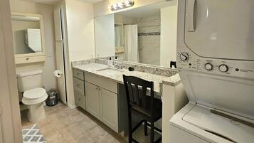 Hair dryer, towels, soap, shampoo