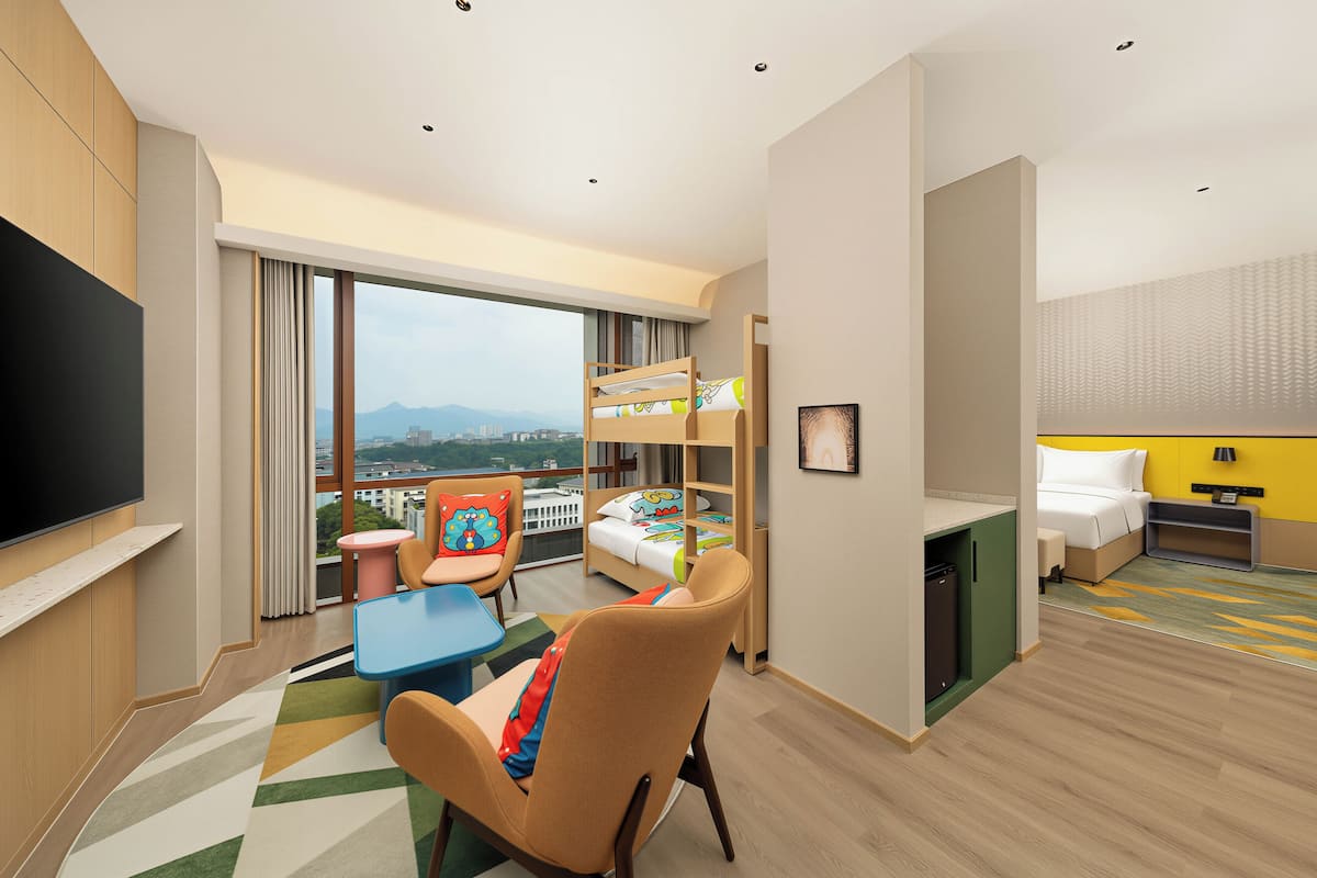 Suite, Multiple Beds | Free minibar, in-room safe, desk, blackout drapes