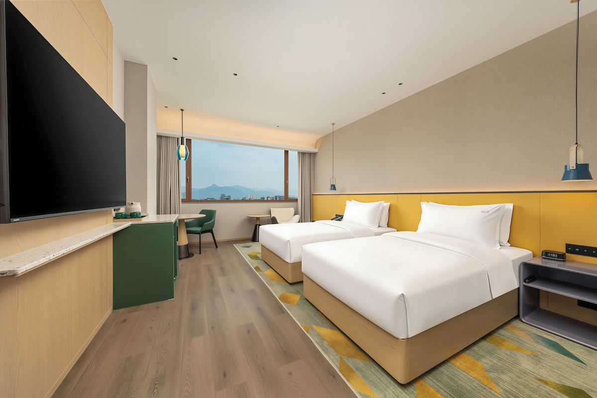 Standard Room, 2 Double Beds | Free minibar, in-room safe, desk, blackout drapes