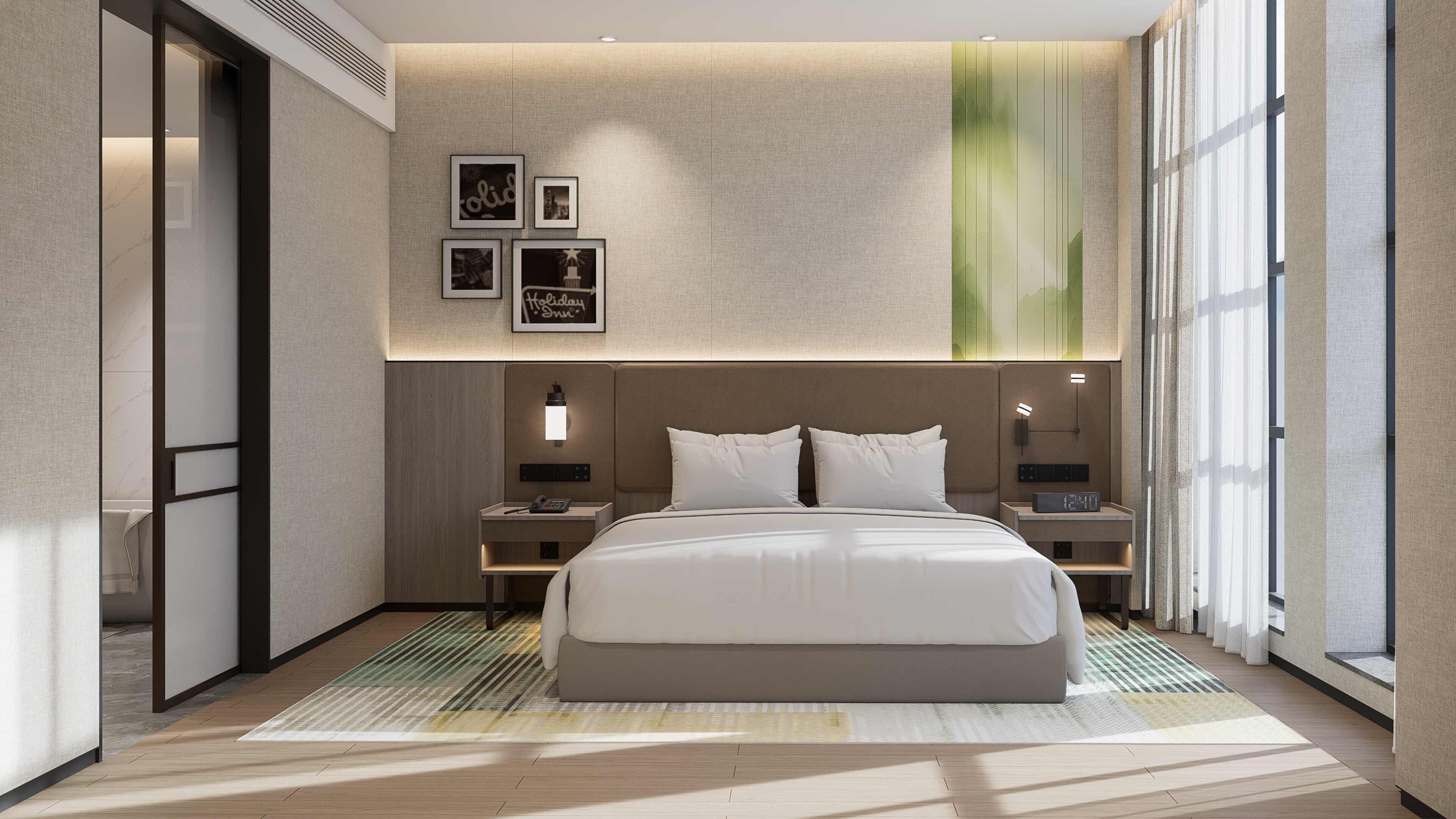 A modern hotel room with a large bed, bedside tables, a wall-mounted artwork, and a large window.