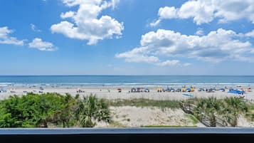 On the beach, sun-loungers, beach towels