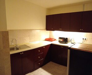 Family Double Room, City View | Private kitchen | Mini-fridge, microwave, dishwasher - Berjaya Times Square Apartment (Kuala Lumpur)