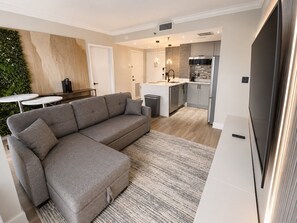 Living area - Modern 2BR Suite at Enclave • 5min Universal (Orlando)