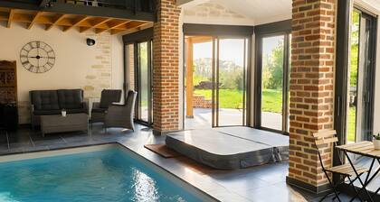 Chambre dâhĂŽtes « Ă Coeur De La Grange » avec terrasse privĂ©e, Wi-Fi et climatisation