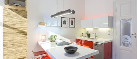 A modern kitchen with a central island, red chairs, a dishwasher, and a white door with a frosted glass panel.