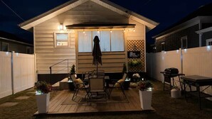 Outdoor dining - The Iris on Main | Game Room•Fenced Yard (Sheridan)
