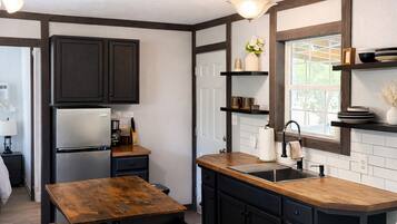 Fridge, microwave, stovetop, coffee/tea maker