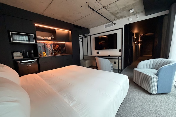 Studio, Courtyard View | Egyptian cotton sheets, premium bedding, down comforters, pillowtop beds