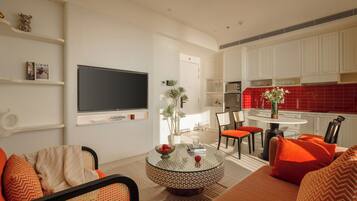 Deluxe Apartment, Balcony, Beach View | Living area | Smart TV