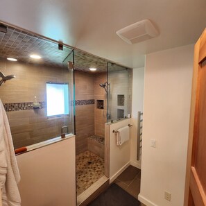 Shower, hair dryer, towels, soap