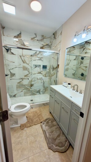 Hair dryer, towels, soap, shampoo