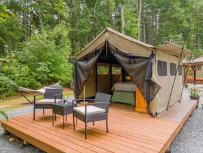Unclassified image, 2 of 18, button - Glamping tent on campground (Sylva)