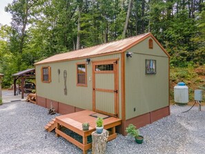 Unclassified image, 4 of 18, button - Glamping tent on campground (Sylva)