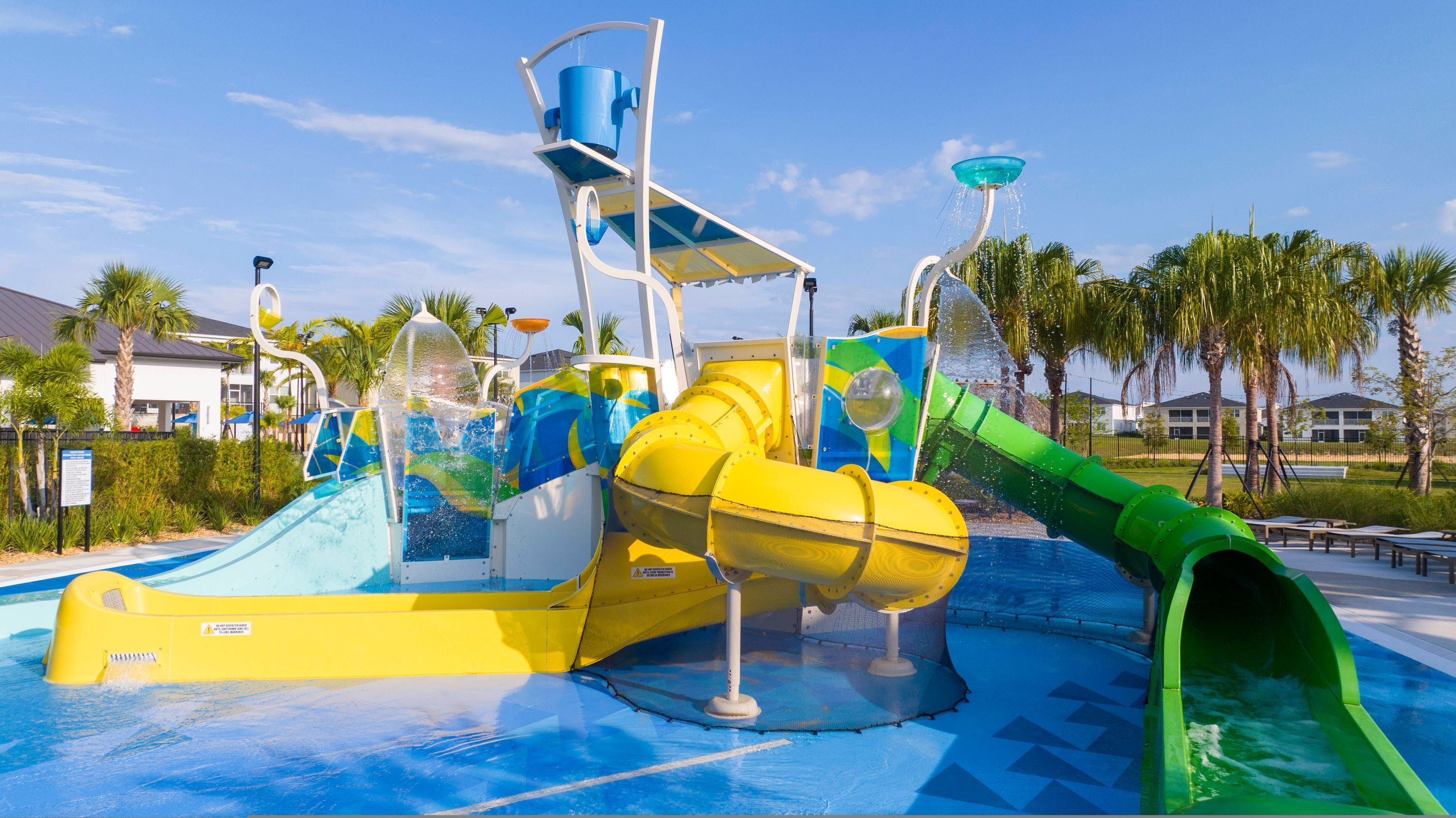 A water park with slides and splash pads.