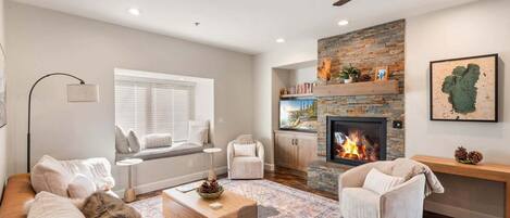 Smart TV, fireplace, books