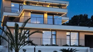 A modern multi-story building with balconies and large windows. - Beautiful home in Zdrelac with sauna (Zdrelac)