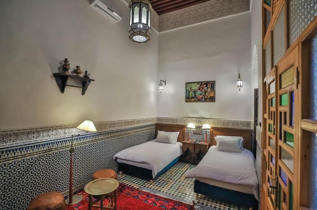 Chambre Deluxe Double ou avec lits jumeaux, patio, vue cour intérieure | Coffres-forts dans les chambres, chambres insonorisées