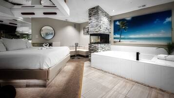 Suite, 1 King Bed | Iron/ironing board, bed sheets