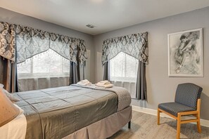 1 bedroom, desk, iron/ironing board, travel crib