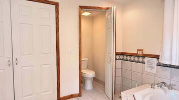 Shower, hair dryer, towels, shampoo