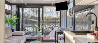 Charming Tiny Houseboat Escape Near Amsterdam by Weltevreden Experience