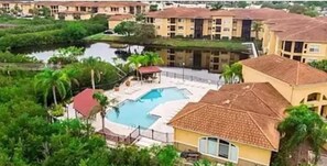 Outdoor pool, a heated pool - Elegant 2 bd/2 bth condo — Modern Luxury Minutes from Downtown & Beaches! (Tampa)