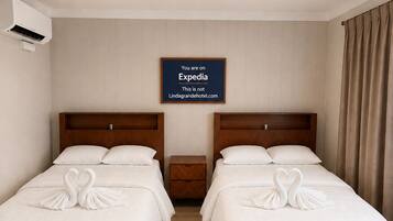 Deluxe Room, 2 Double Beds | WiFi (free), bed sheets
