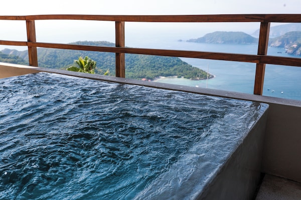 Deluxe Villa, 2 Bedrooms, Patio, Sea View | Outdoor spa tub