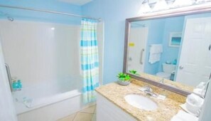 Jetted bath, hair dryer, towels, soap