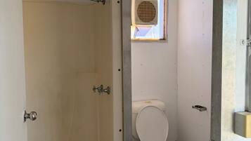 Shower, towels, soap, toilet paper