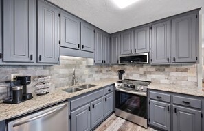 Private kitchen - 2BR 1BA Cozy Townhome • All the Amenities • Patio • Minutes from I-40 (Jackson)