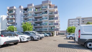 A multi-story parking garage with several cars parked. - Port Soleil by Interhome (Arcachon)