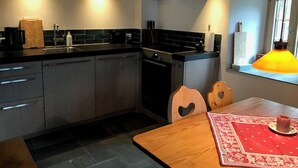Fridge, microwave, oven, cookware/dishes/utensils - Casa Vanellus, Vignogn, (Vignogn), 47005B by Interhome (Vignogn)
