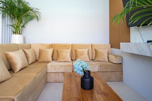 Luxury Villa, Pool View | Living area | 50-inch Smart TV with digital channels - Letto Villas (Kuta Utara)