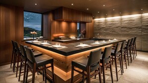 A modern kitchen with a large island, wooden cabinetry, and a view of the outdoors. - ANDO HOTEL RETREAT HAKONEGOURA (Hakone)