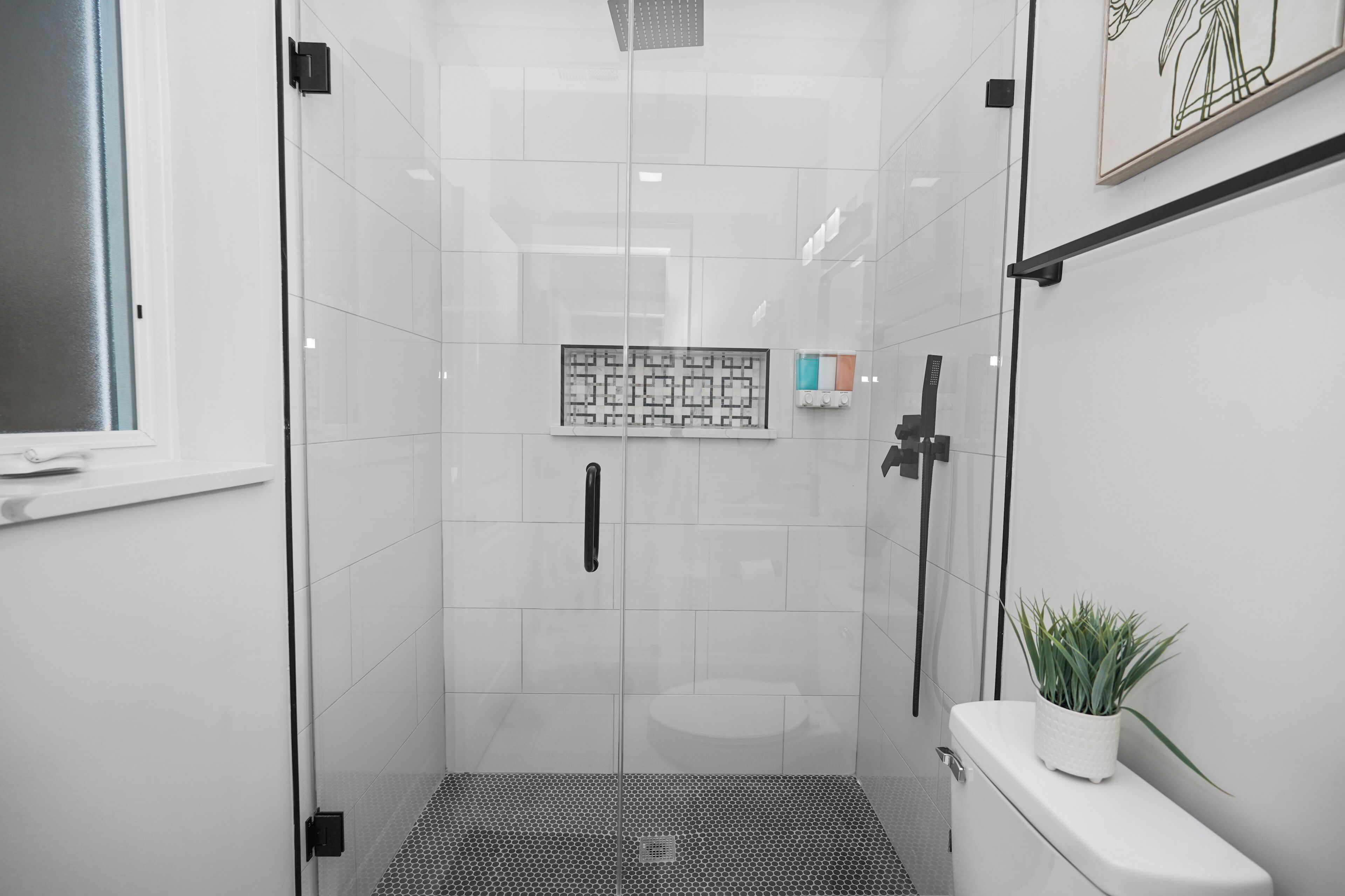 Shower, hair dryer, towels, soap