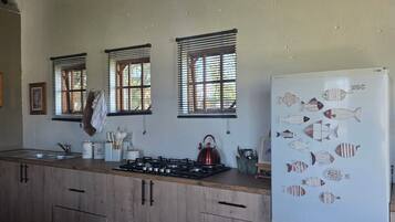 Fridge, oven, cookware/dishes/utensils