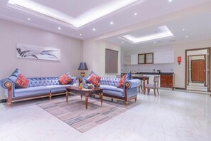 55-inch LCD TV with cable channels - Makeen Homes ApartHotel (Riyadh)