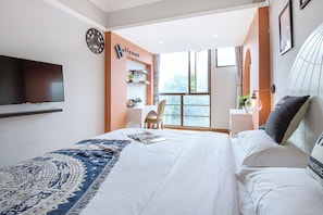 Classic Double Room, Partial Ocean View | Laptop workspace, iron/ironing board, free WiFi
