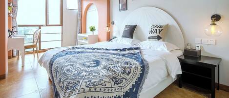 Classic Double Room, Partial Ocean View | Laptop workspace, iron/ironing board, free WiFi