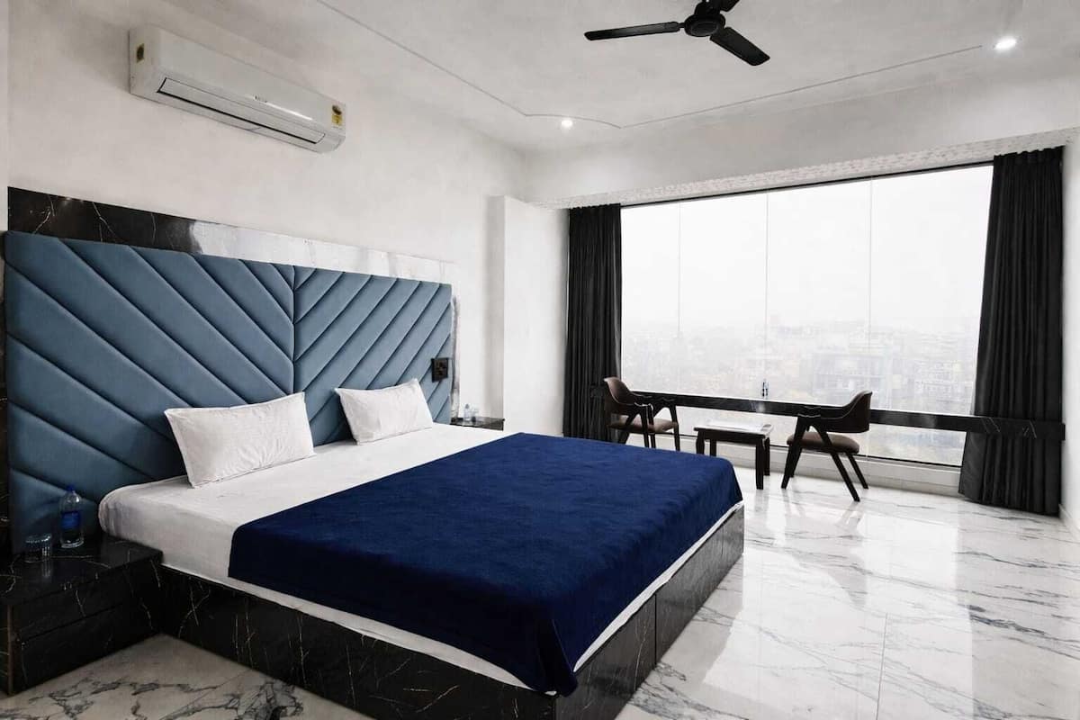 Family Double Room, City View | Laptop workspace, iron/ironing board, free WiFi